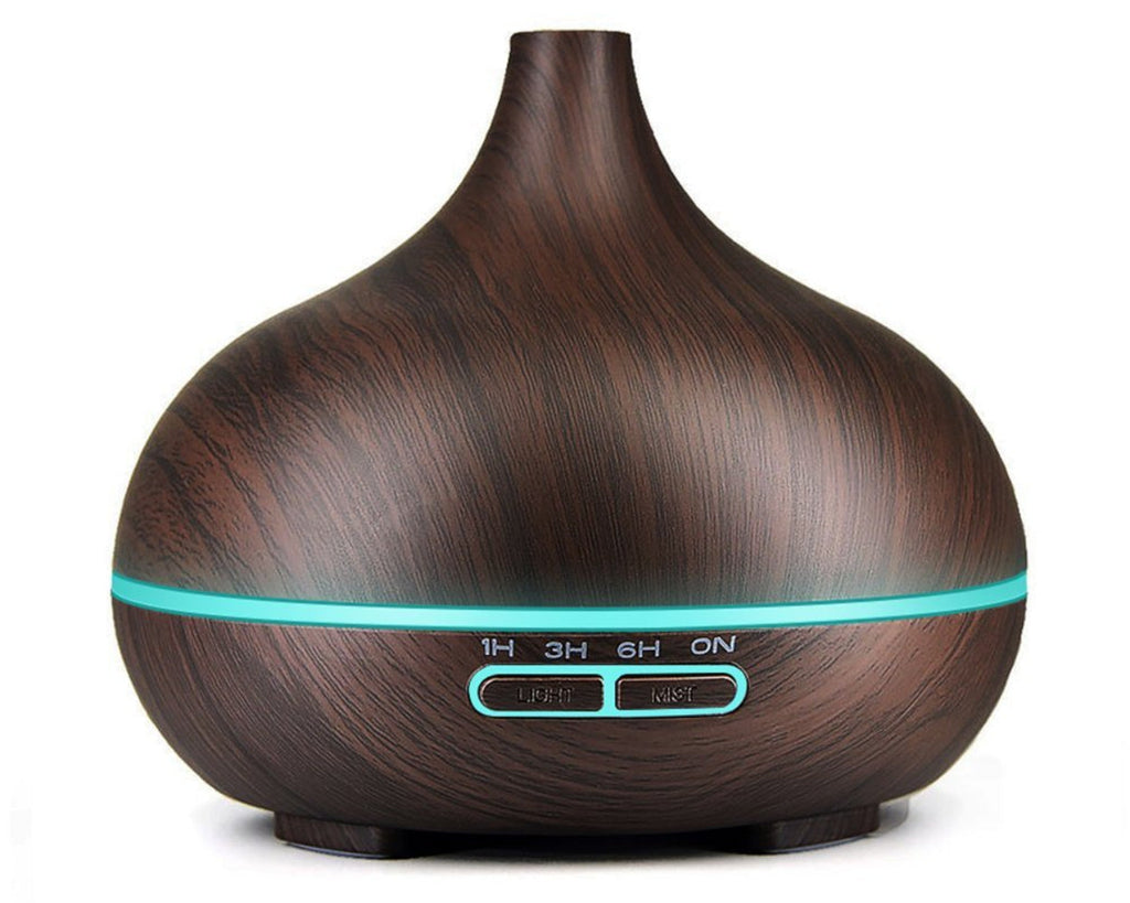 Wooden-textured diffuser with blue LED lights on a white background