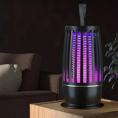 Black purifier with purple light on a wooden surface, dark background